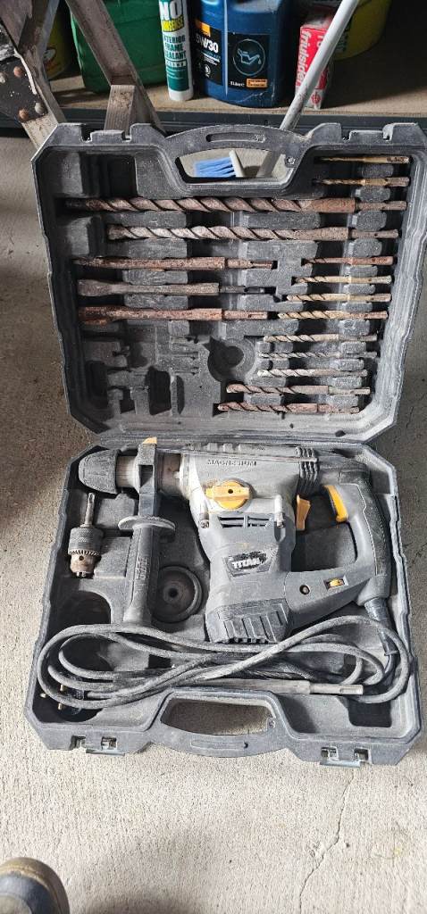 Used Titan Breaker with Drill Bits