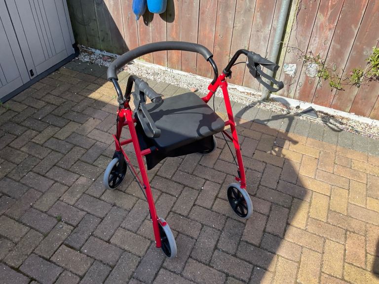 RED MOBILITY WALKER ROLLATOR 
