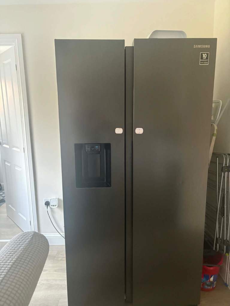 Samsung American style fridge freezer with ice and water dispenser