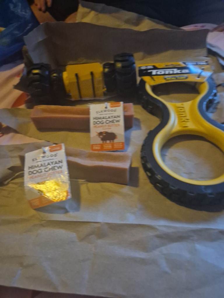 4 large mixed dog toys 2 tonka toys and 2 extra large yakers
