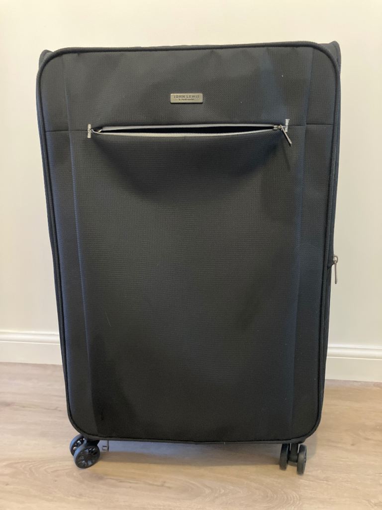 Black Large Suitcase with Wheels – Good Condition