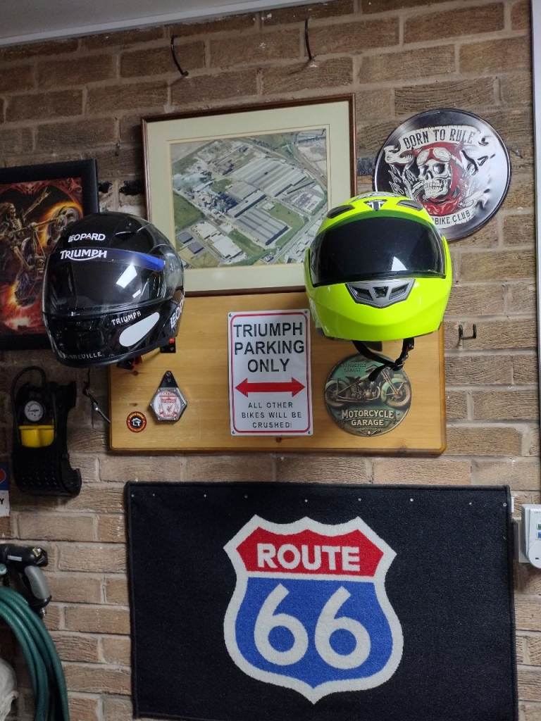 Motorcycle helmet holders 