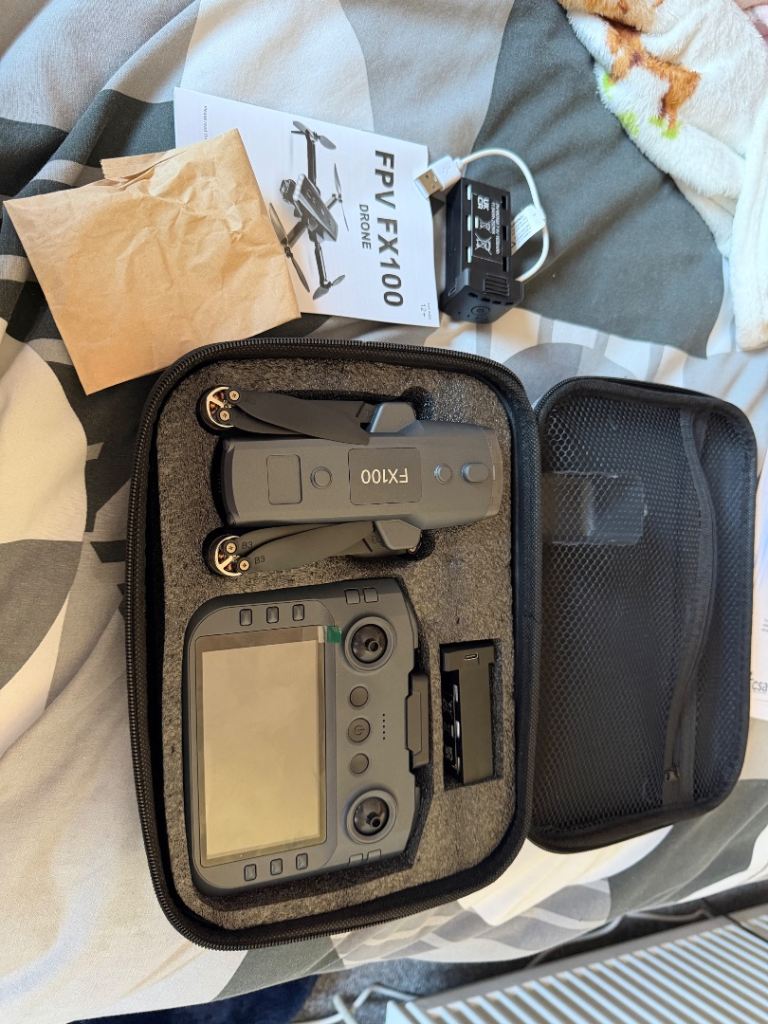 FPV FX100 Drone with Controller and Case – brand new was taken out of box but never actually used 