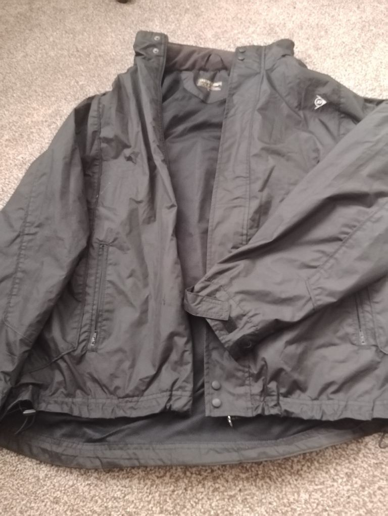 Dunlop black golf jackets size large - price is per coat, two available