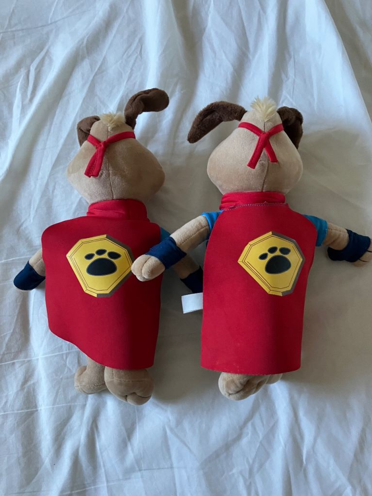 2 tui soft toy dogs