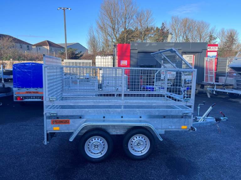 BRAND NEW 8,2FT X 4,3FT TWIN AXLE TRAILER WITH 60CM MESH AND RAMP 1300KG BRAKED