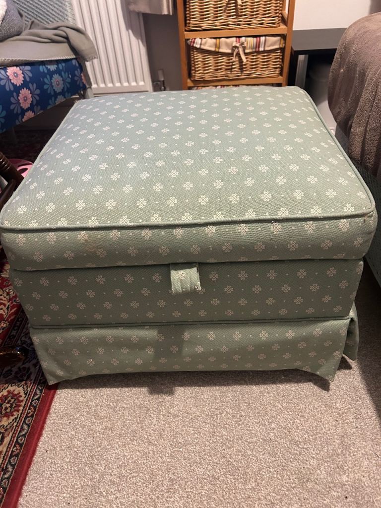 Green and white storage footstool 
