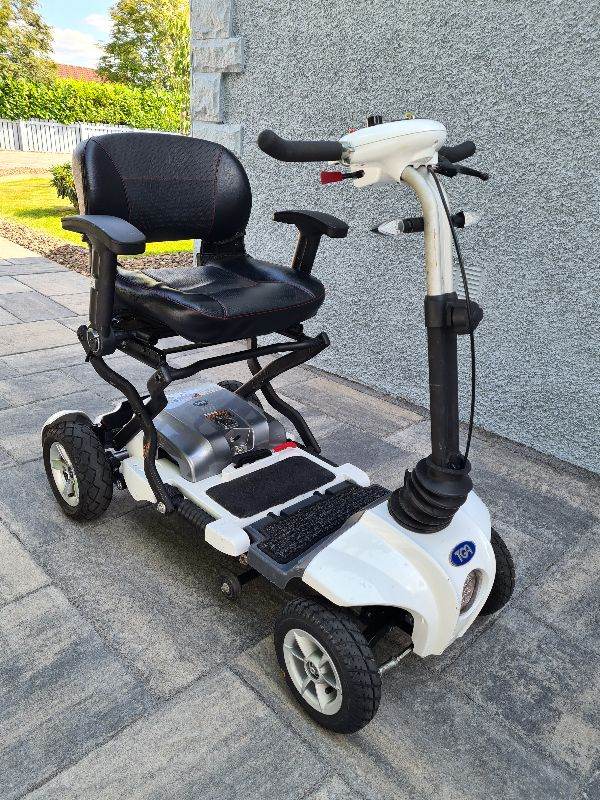 Can deliver tga medium one fold TGA Mobility Scooter – As Good As New, White