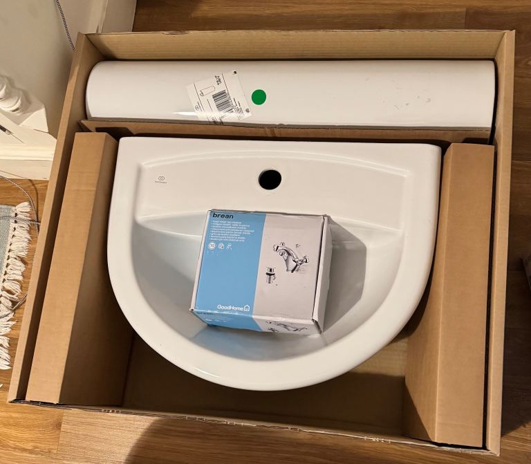 Pedestal sink and mixer tap..