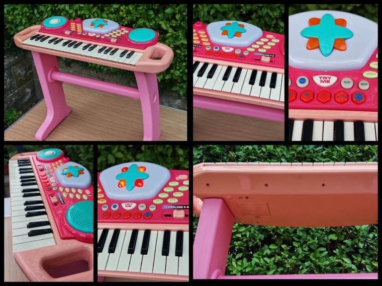 Pink Kids Electronic Keyboard with Stand – Good Condition