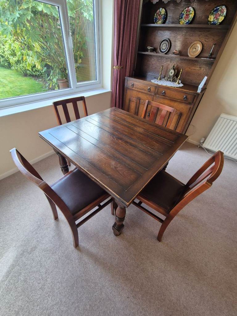 Extending Oak Table and 4 Leatherette chairs 