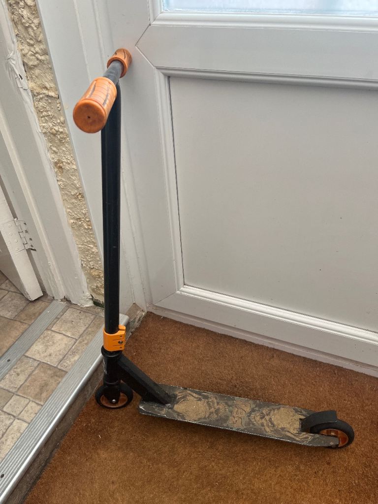 Used Stunt Scooter - Black and Orange, Fair Condition