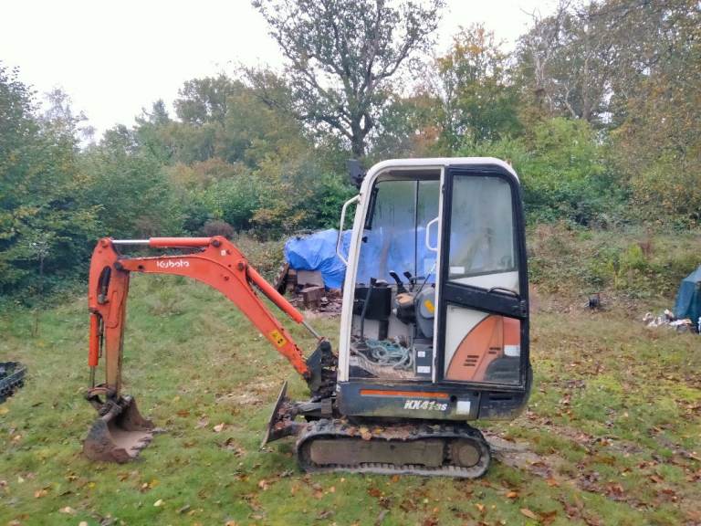 Kubota mini digger and plant trailer