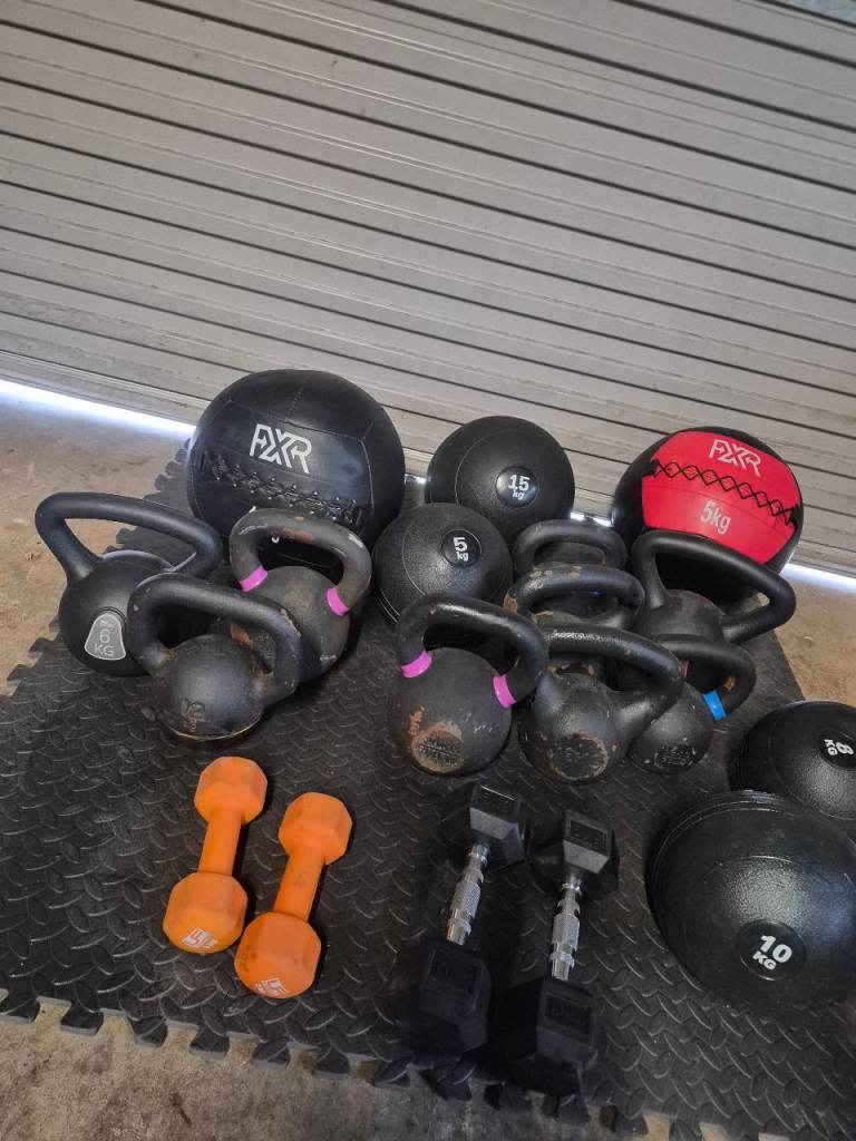 Mixed Gym Equipment: Kettlebells, Dumbbells, Medicine Balls, and Plyo Boxes