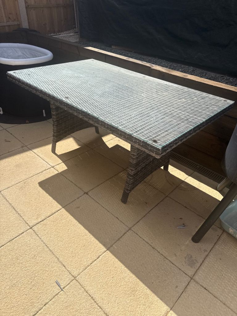 Rattan Garden Dining Table with Glass Top – Good Condition