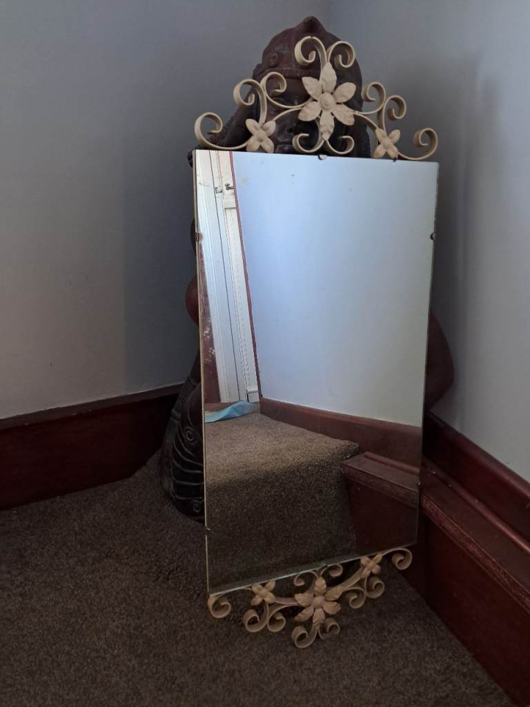 Mirror with iron detail