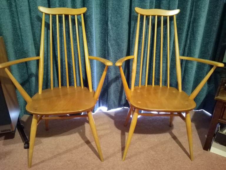 Pair of blonde Ercol Goldsmith carver chairs