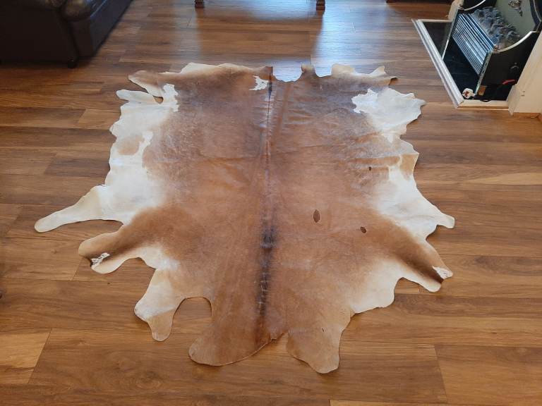 Cow skin rug brown and white £95