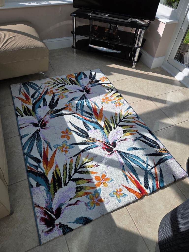 Floral Patterned Rug.