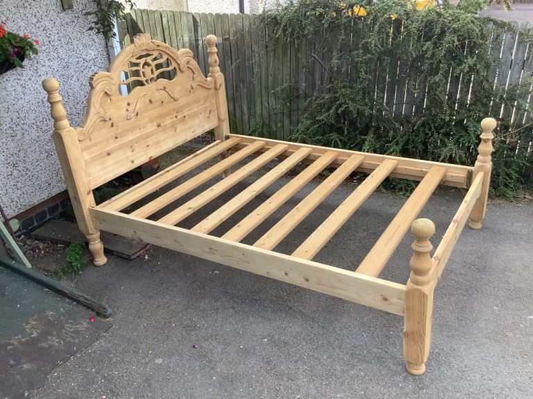 Solid, Chunky modern pine double bed with spindle turned supports 