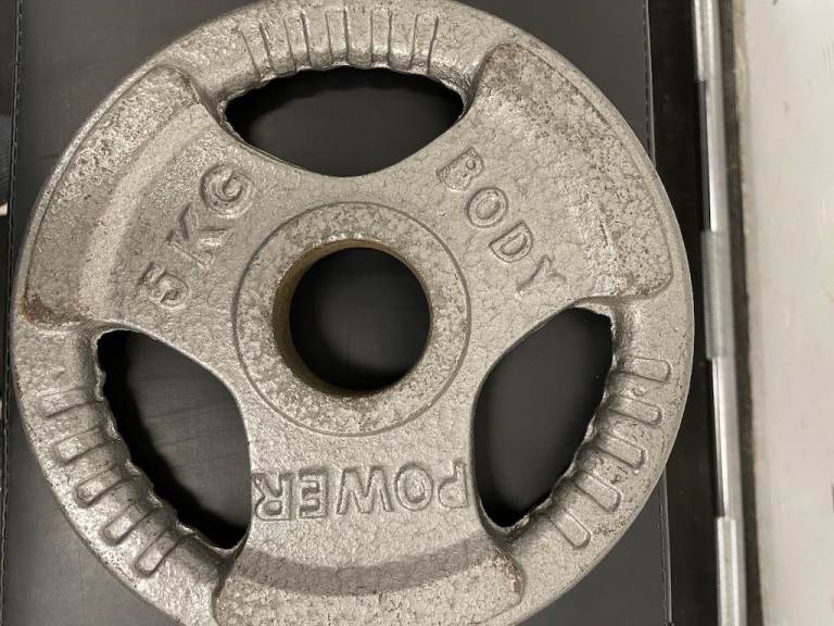Bundle of weight plates, olympic bar, EZ bar & weight tree