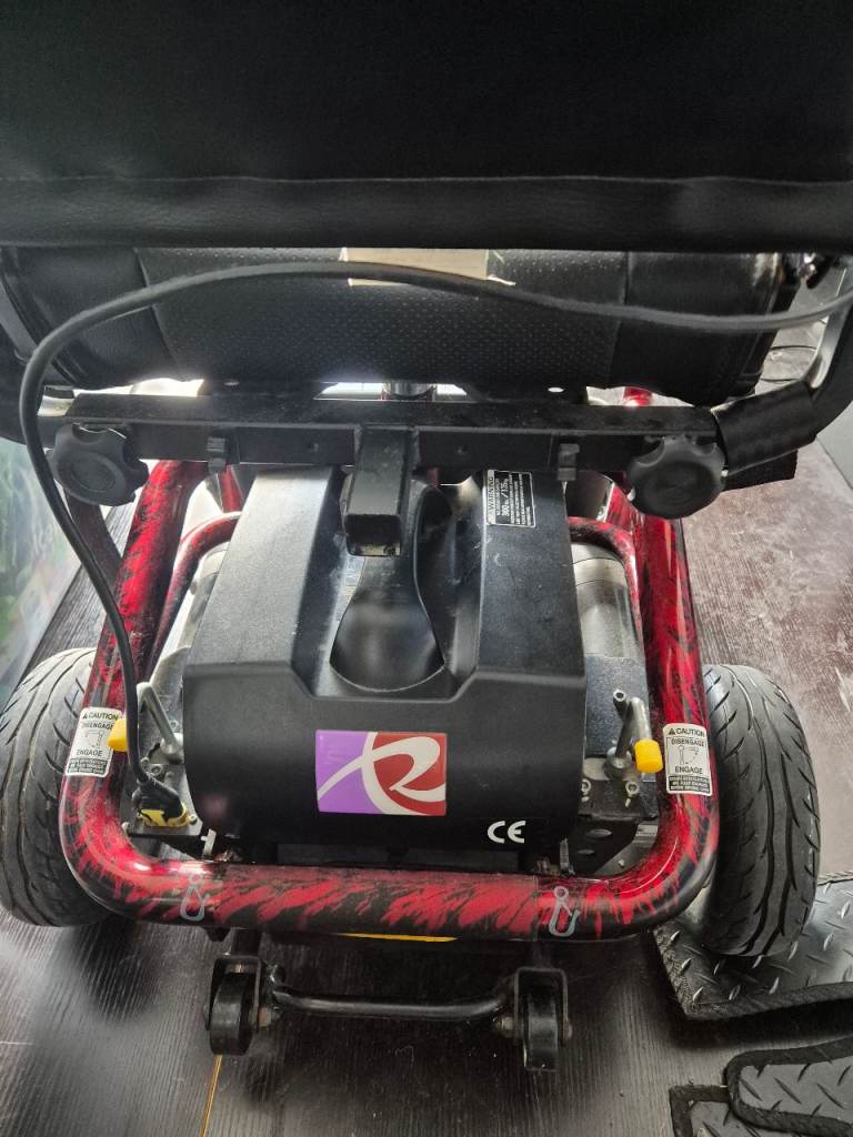 Red and Black Mobility Scooter -2 new batteries and charger