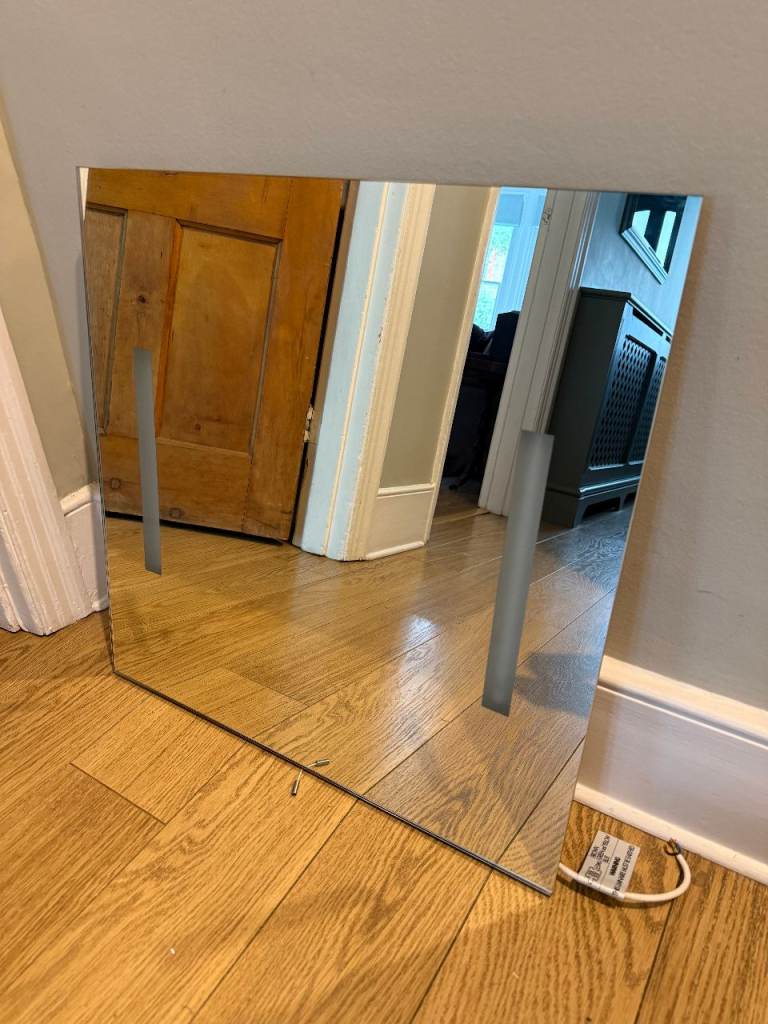 Illuminated bathroom mirror