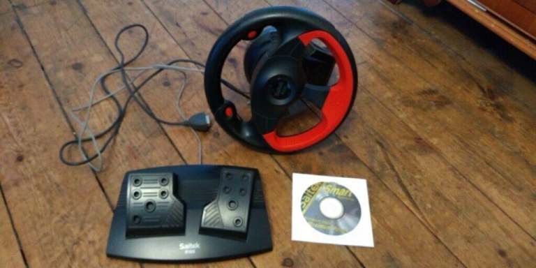 Saitek Steering wheel and pedals R100