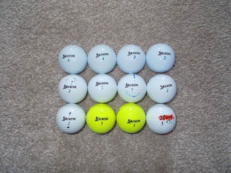 12 SRIXON Soft Feel Golf Balls, in Grade A/B condition. 