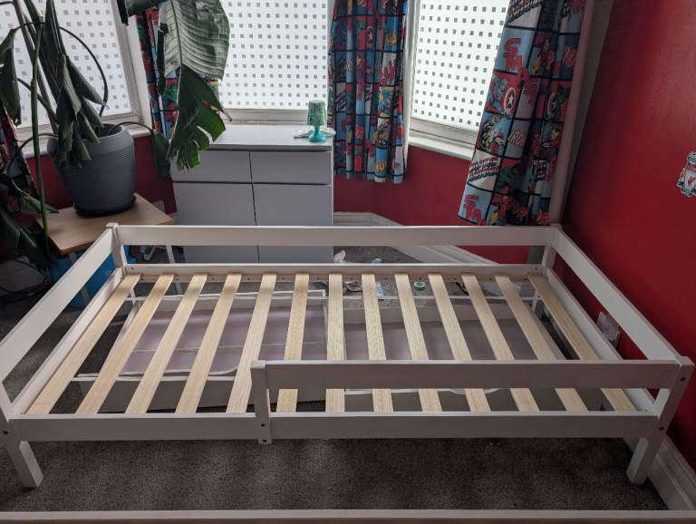 Single bed with built in bed guard 