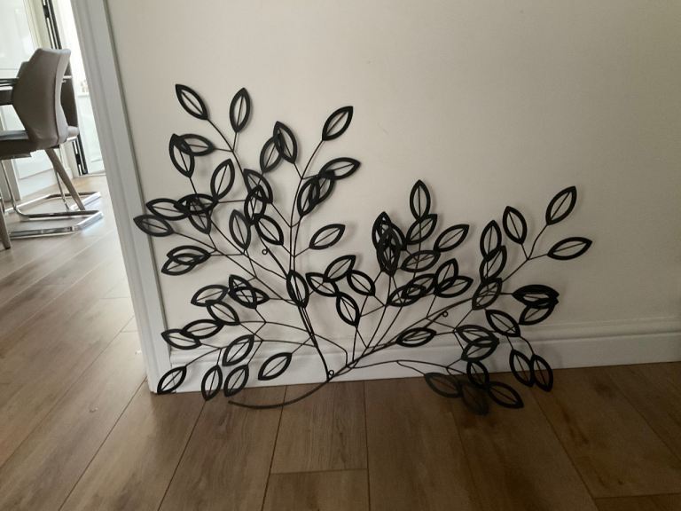 Metal tree branch wall art.