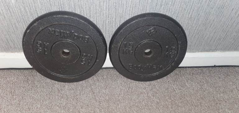 Standard 1 inch 7ft barbell with collars and pair of 15kg BodyMax cast iron weight plates