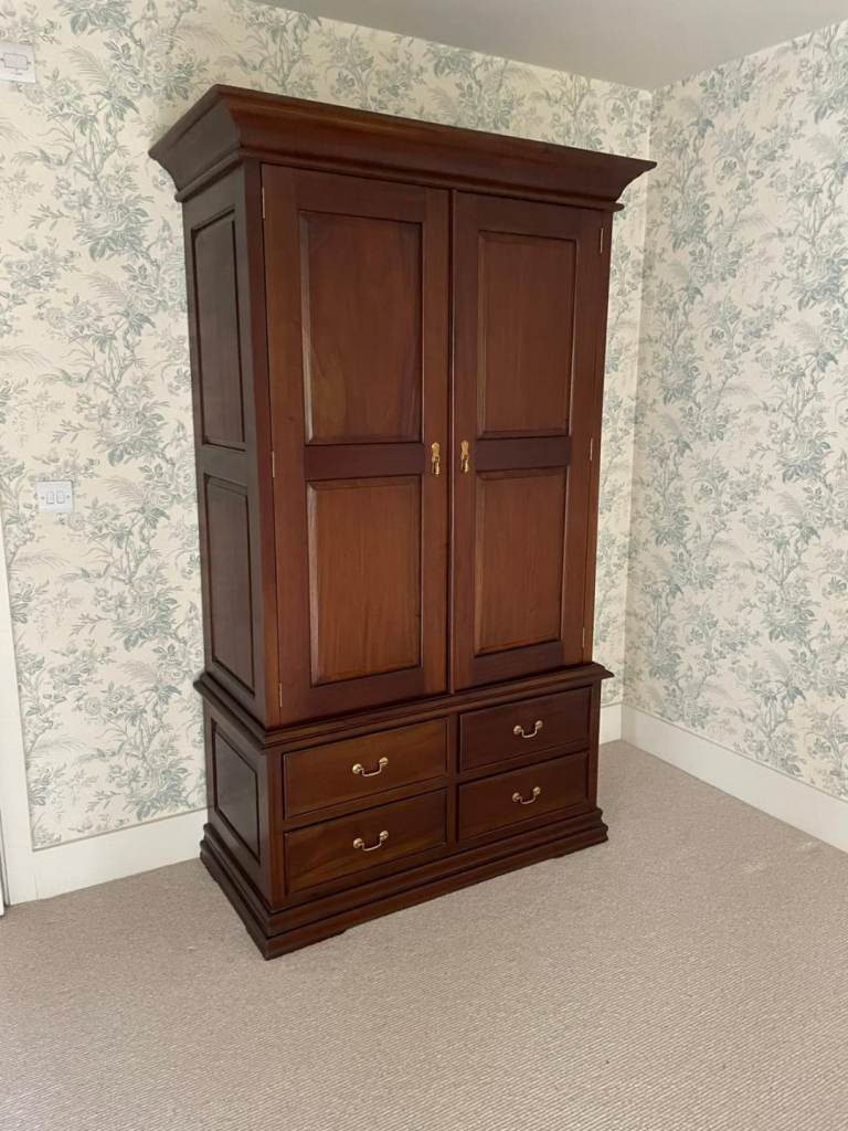 French Sleigh Mahogany Wardrobe Featuring four drawers