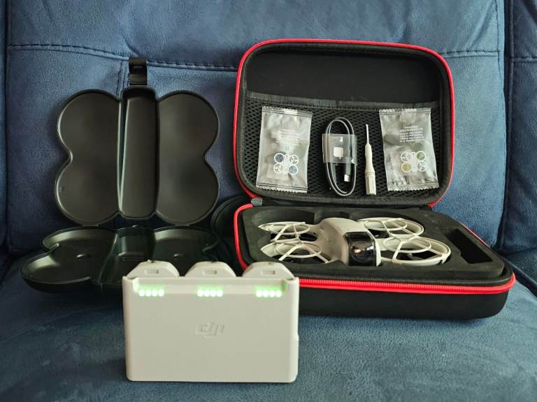 DJI Neo with Care Refresh, 3 batteries, spare propellers,  two-way charging hub and 2 cases