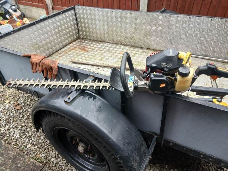 Petrol hedge cutters long blade homelite