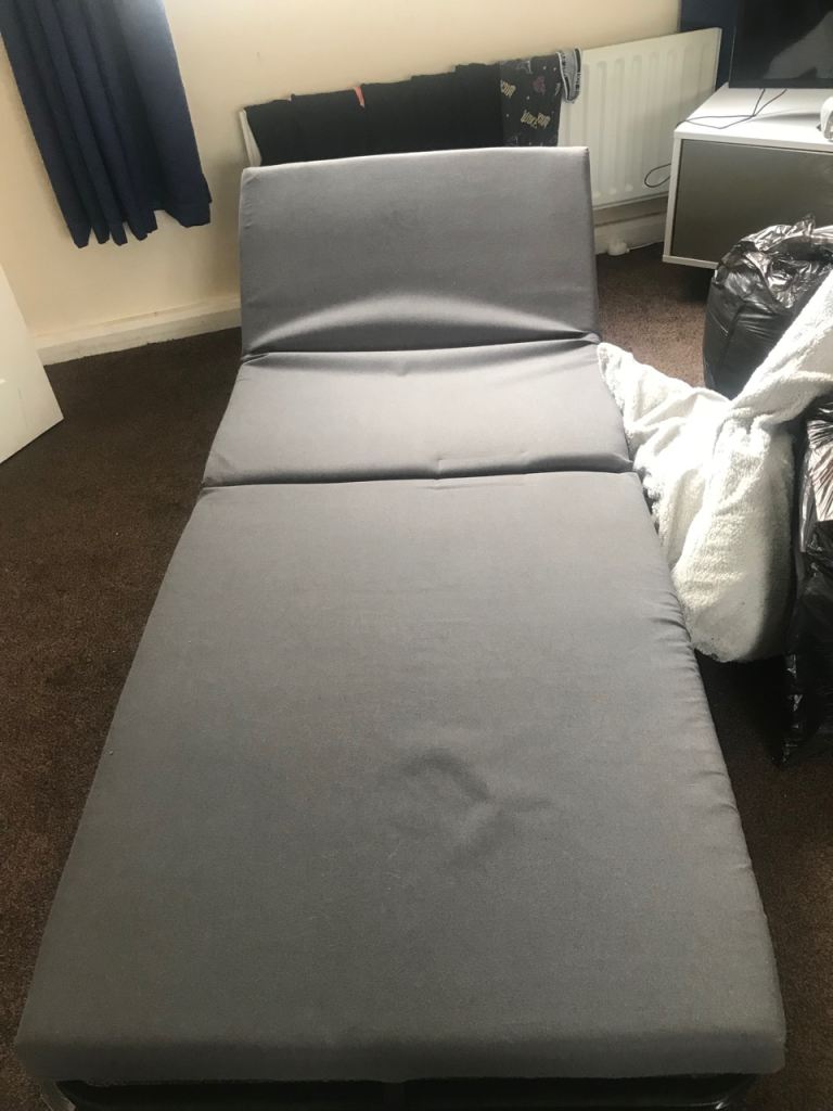 Single black metal framed foldable bed with mattress 