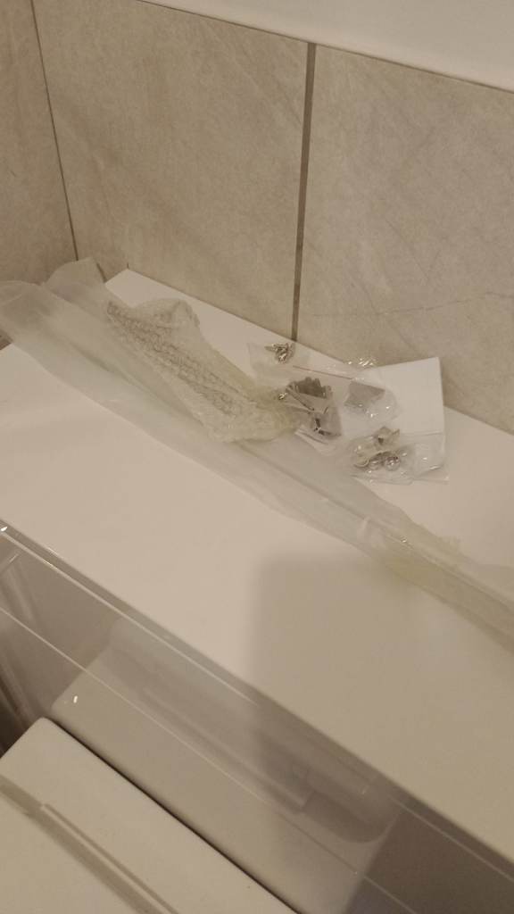 Unused shower screen.