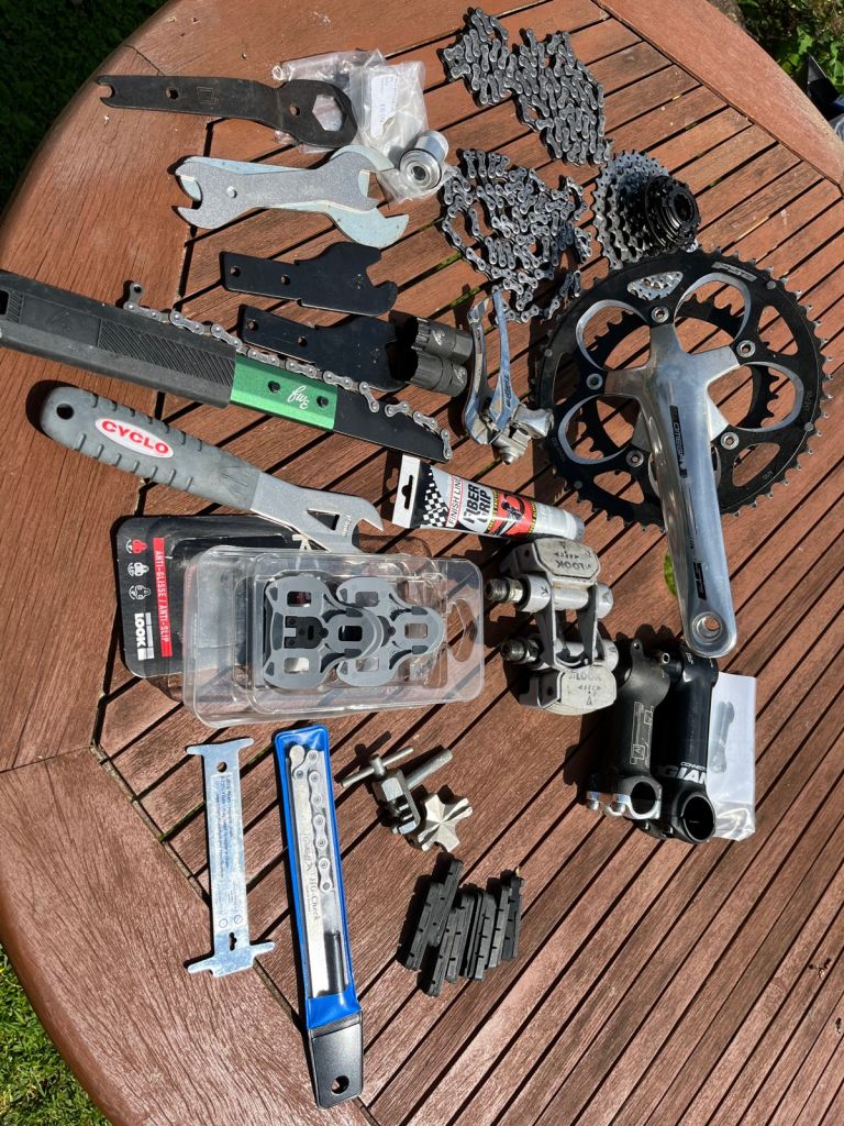 JOB LOT OF BIKE PARTS/SPARES/TOOLS ETC.