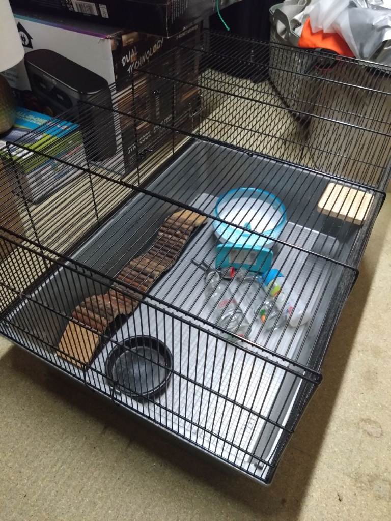 Hamster cage with wheel