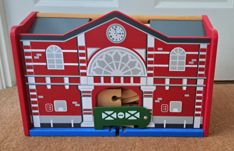 Wooden train set with station box and accessories