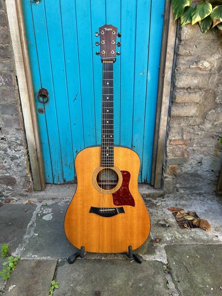 Taylor 310 Dreadnought Guitar. 