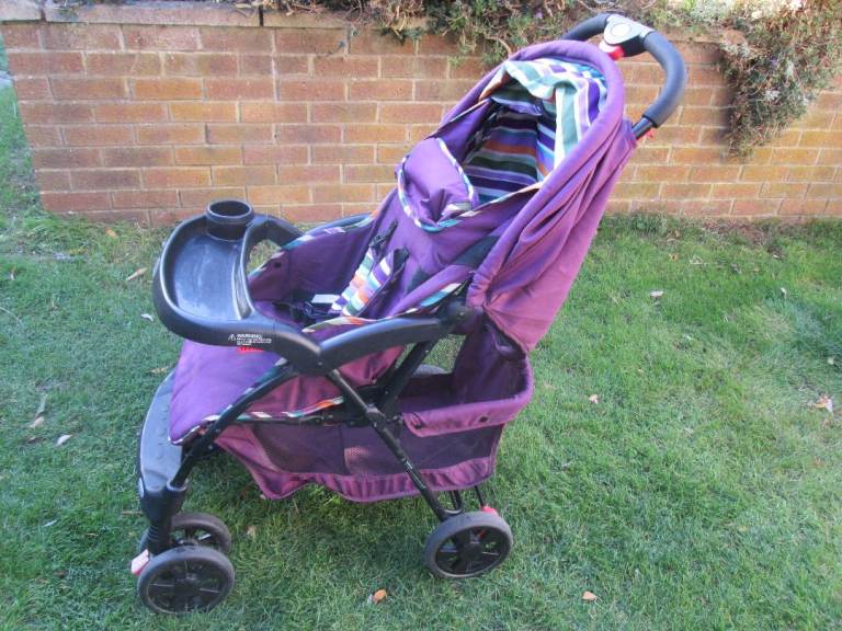Obaby Monty Pushchair. Purple with all accessories.