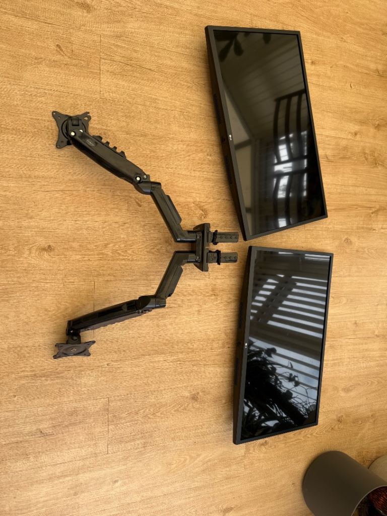 Two monitors and double monitor arm