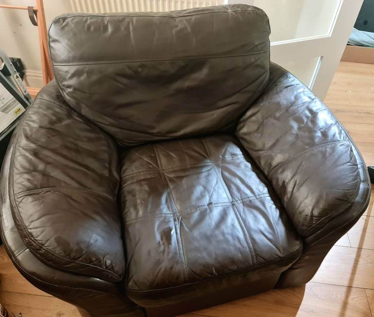 Comfortable Brown Leather Armchair  and 2 setter – Good Condition