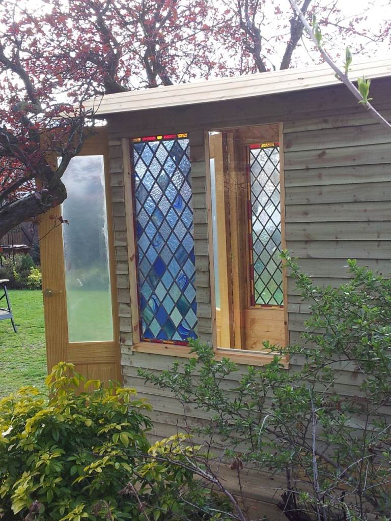 Stained glass panels 48 x 20 inches (2) and 44 x 20 inches (1)