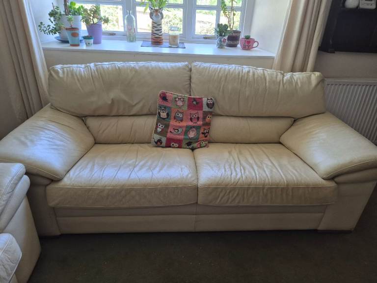 Cream Two-Seater Leather Sofa – Good Condition