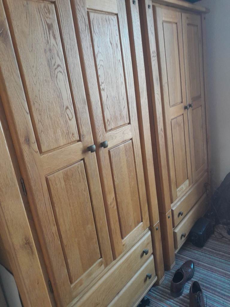 Pair of Brown Wooden Wardrobes with Base Drawers – Good Condition