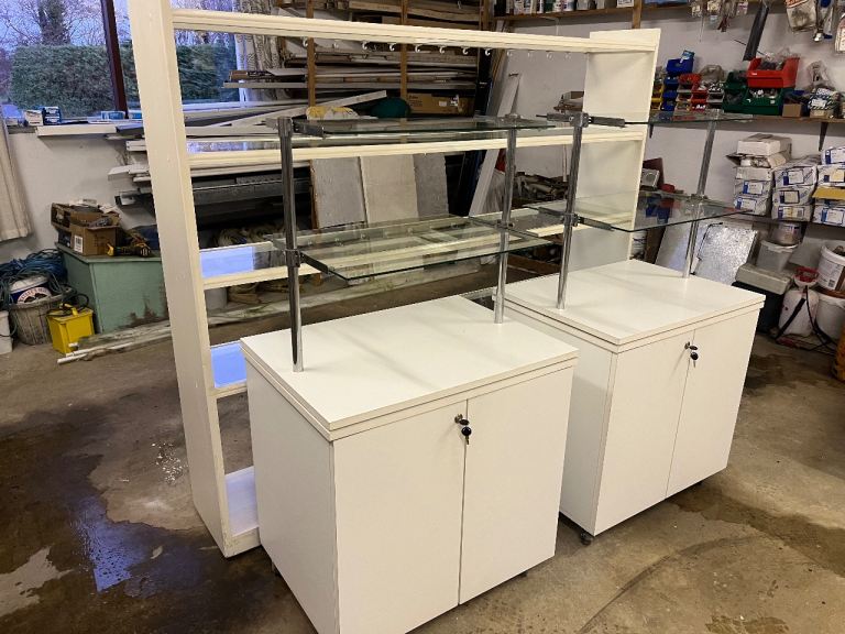 3x Glass retail shop display units on wheels