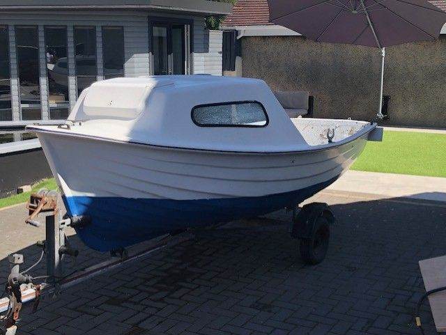 12.5' Fishing Boat with 4HP Engine & Trailer – Fair condition for age