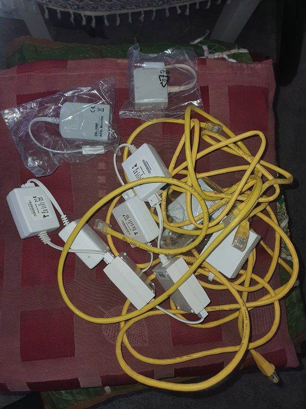 Router comms cable and a number of ADSL filters